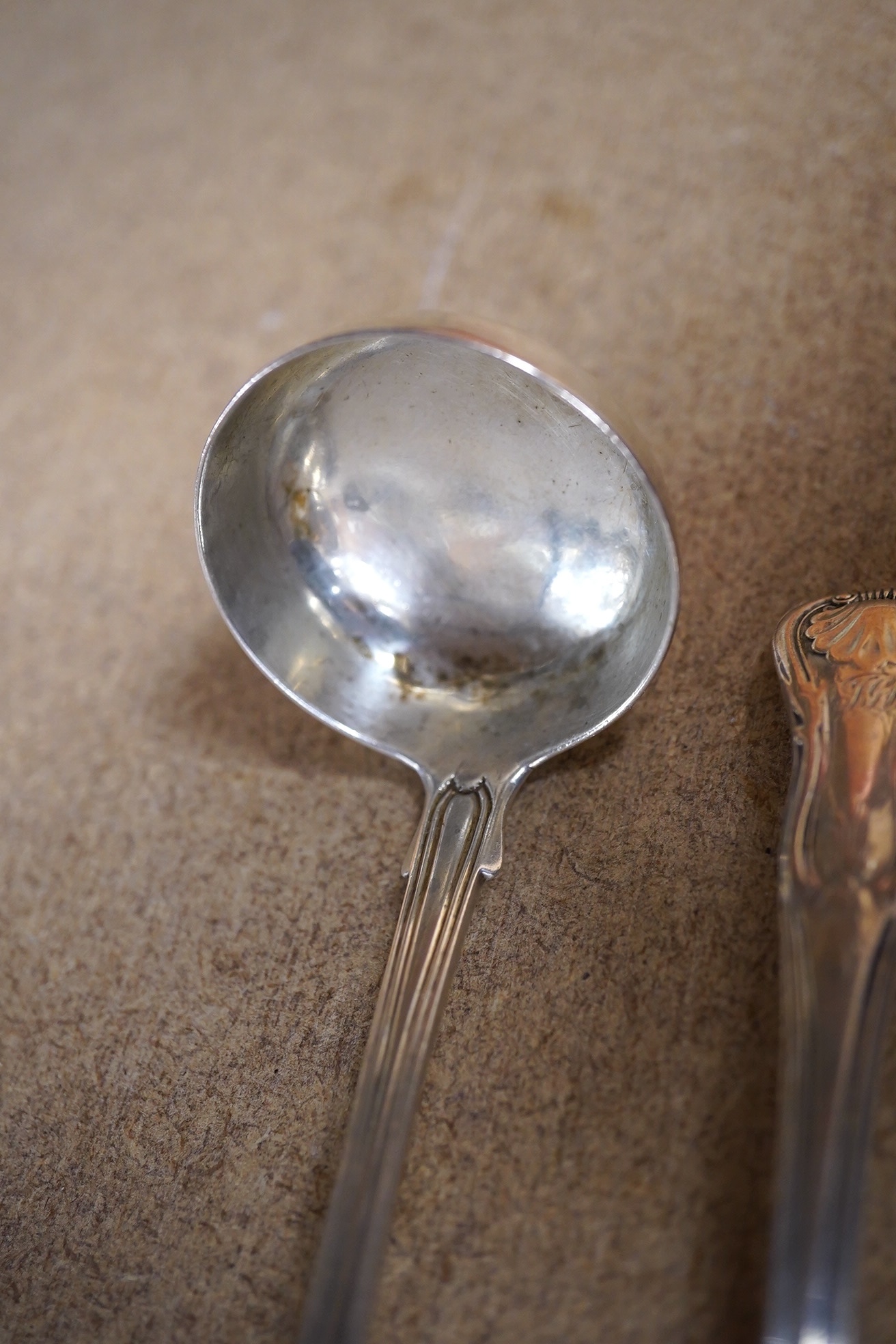 A pair of William IV Scottish silver King's pattern toddy ladles, James & William Marshall, Edinburgh, 1830, 14.2cm, 71 grams. Condition - poor to fair